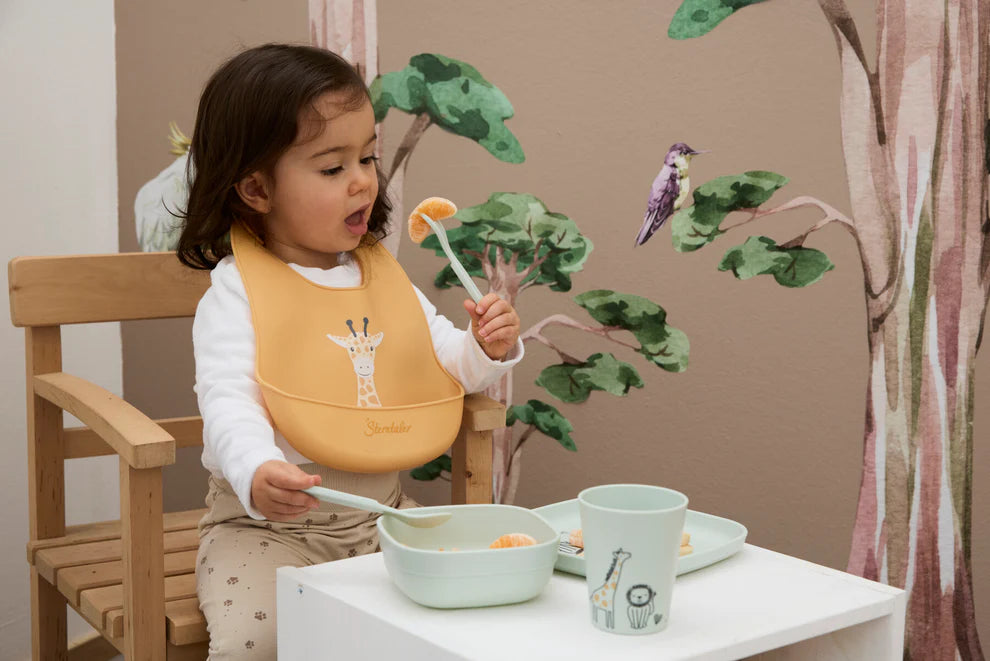 Bavaglino in silicone giraffa gialla | STERNTALER